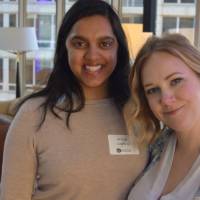 Two alumnae pose together for a photo at the Chicago Reception